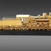На память: Бронзовый паровоз «Э-7815» на долерите — фотография 2